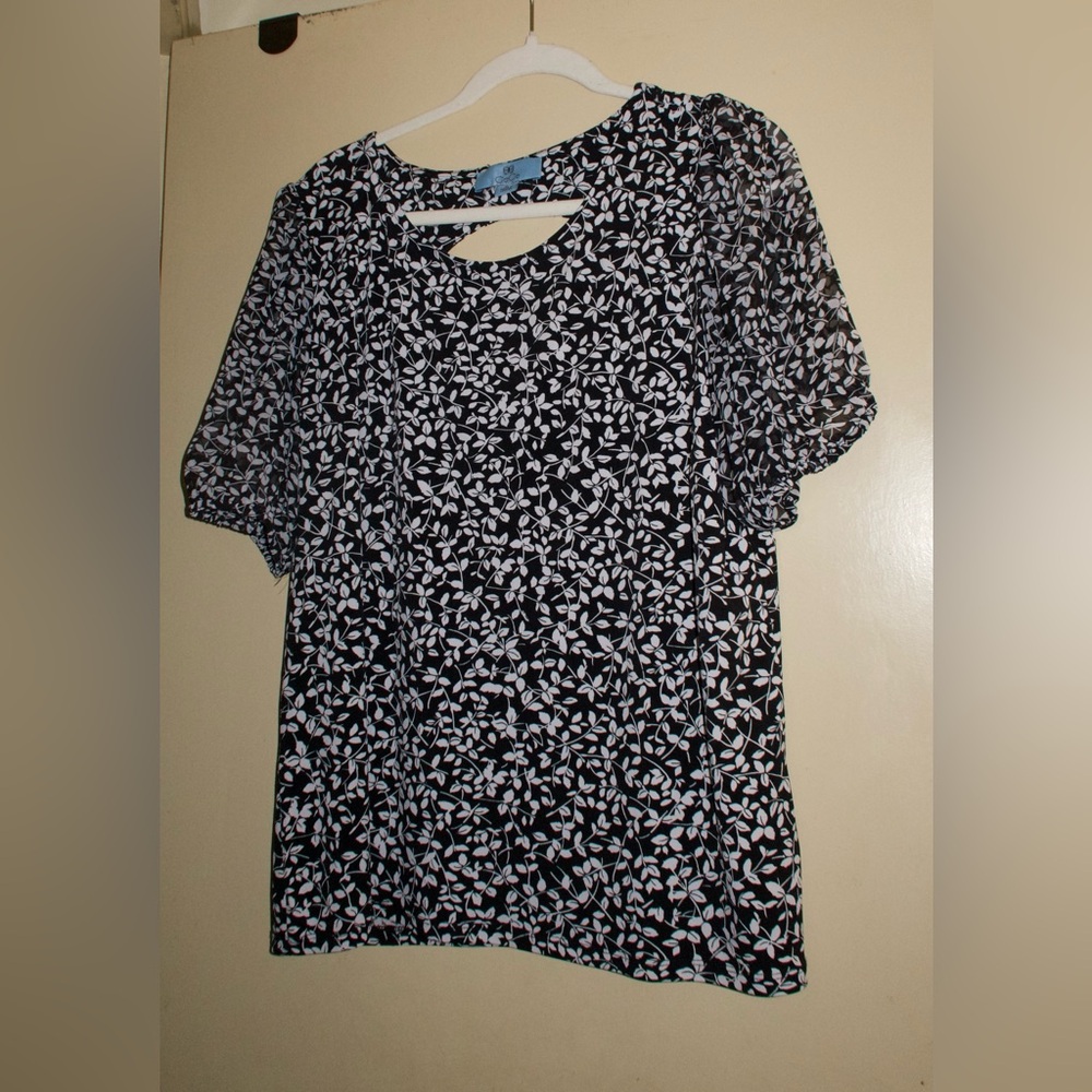 CeCe Black and White Cut Out Blouse